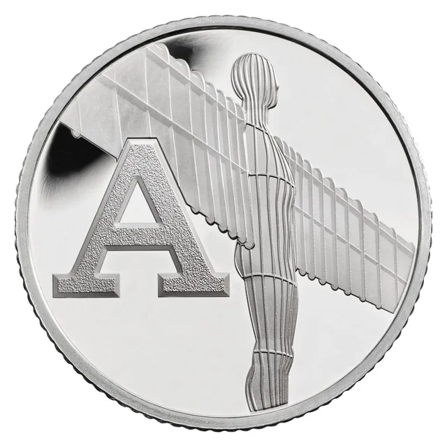 The Angel of the North sculpture with its ribbed wings spread behind a large capital letter A