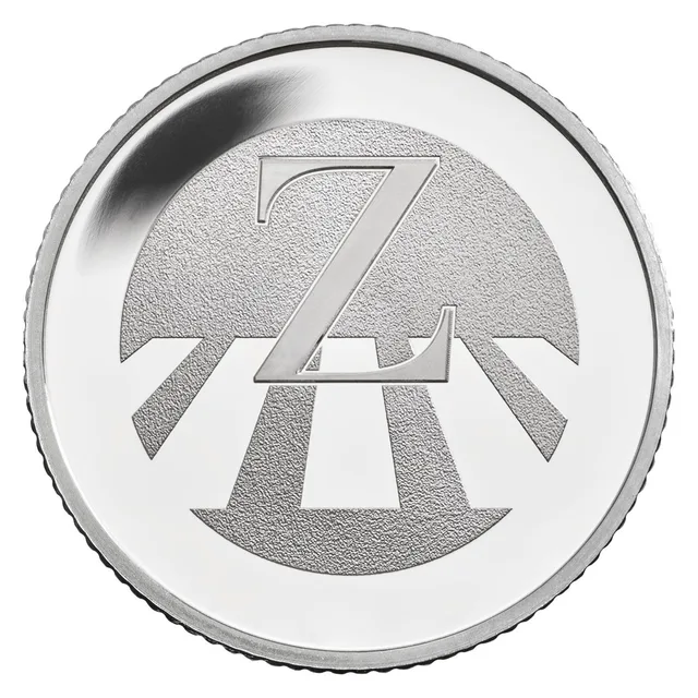 A large capital letter Z standing on the stripes of a zebra crossing, in front of a half-circle