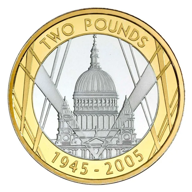 St Paul's Cathedral lit by searchlights, with TWO POUNDS above and the dates 1945-2005 below