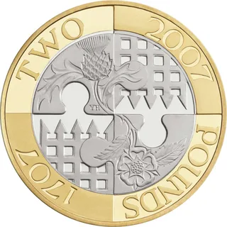 Quartered jigsaw design: thistle and rose on one stem, two portcullises, with TWO POUNDS and two dates on the ring