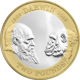 Charles Darwin in profile facing a chimpanzee, DARWIN between two dates above, TWO POUNDS below