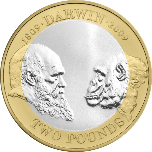 Charles Darwin in profile facing a chimpanzee, DARWIN between two dates above, TWO POUNDS below