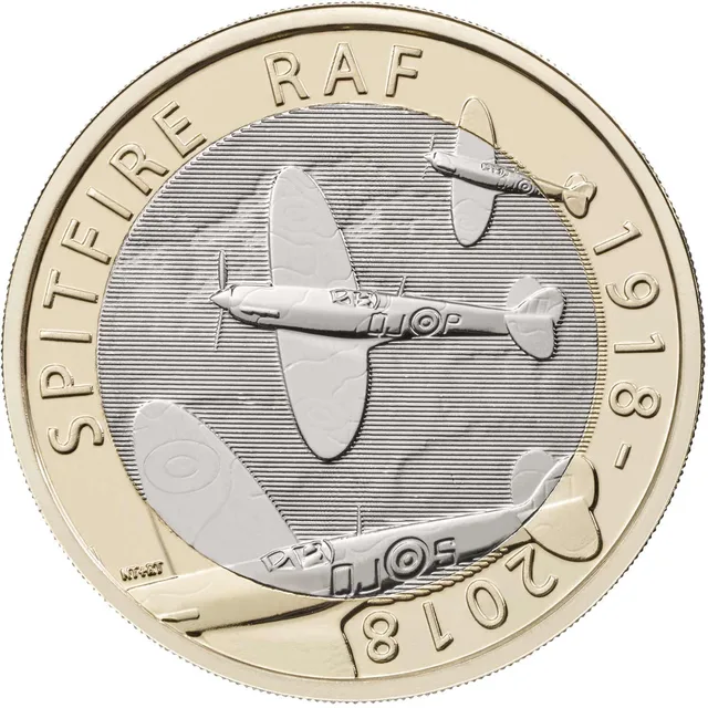 Three Spitfire fighters in flight, the largest crossing into the outer ring, with SPITFIRE, RAF and 1918-2018 around