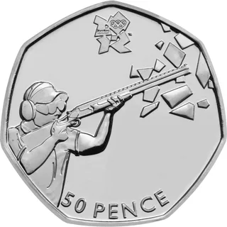 Clay shooter in ear defenders aiming a shotgun as the target shatters into angular pieces, London 2012 logo above