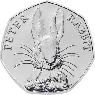 Close-up of Peter Rabbit with prominent whiskers in the centre, his figure dividing the words PETER RABBIT