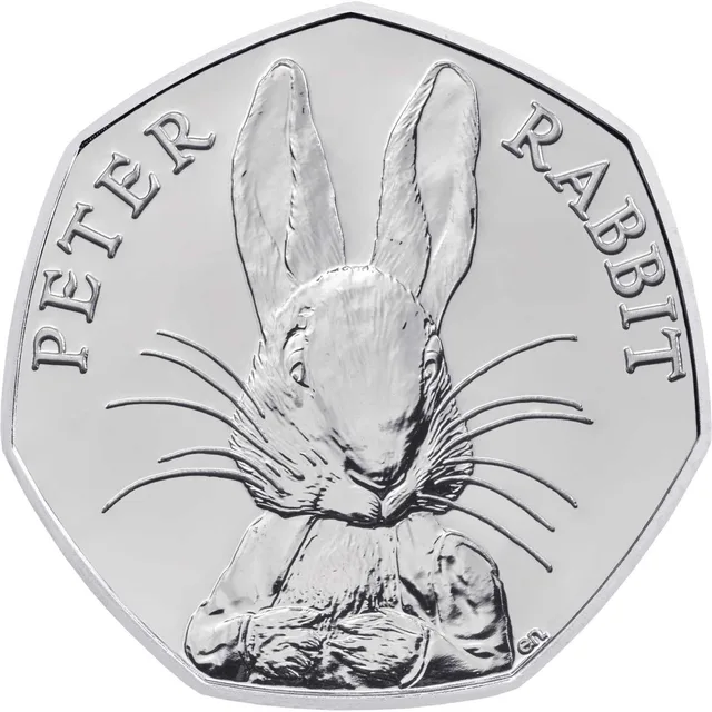 Close-up of Peter Rabbit with prominent whiskers in the centre, his figure dividing the words PETER RABBIT