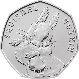 Squirrel Nutkin in a lively pose in the centre of the coin, his figure dividing the words SQUIRREL NUTKIN