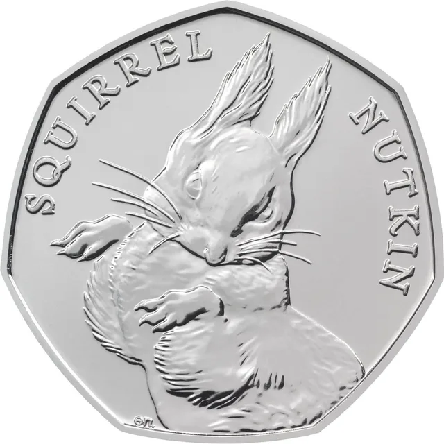 Squirrel Nutkin in a lively pose in the centre of the coin, his figure dividing the words SQUIRREL NUTKIN