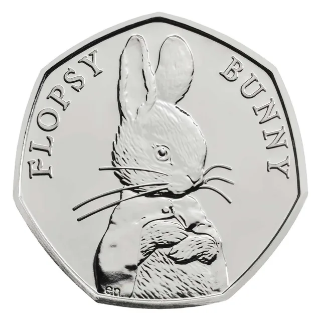 Flopsy Bunny, Peter Rabbit's sister, faces forward with the name FLOPSY BUNNY split around her
