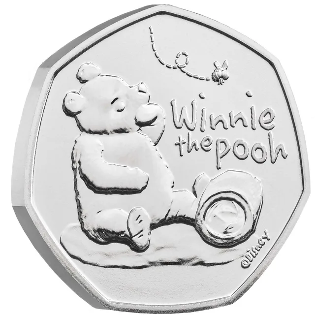 Winnie the Pooh sitting beside a tipped-over honey jar with a bee above him and his name to the right