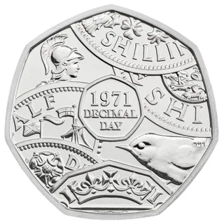Overlapping pre-decimal coins around a seven-sided outline holding the words 1971 DECIMAL DAY