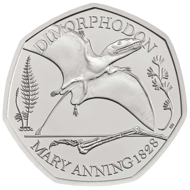Dimorphodon pterosaur with wings spread across the coin, DIMORPHODON above and MARY ANNING below