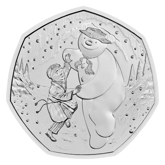 The Snowman and James dancing together beneath the Northern Lights