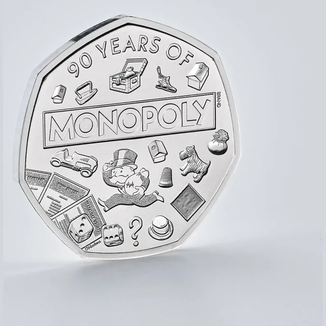 Mr Monopoly with the MONOPOLY logo among playing tokens and property cards, and a lenticular GO sign